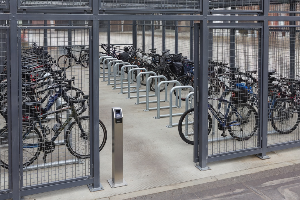 Secure access-controlled cycle cage compound